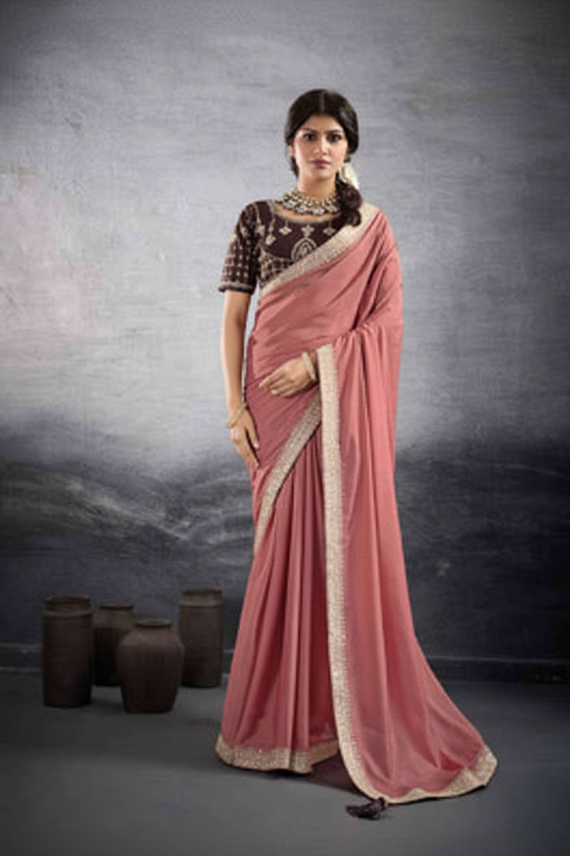 A side-by-side catalog display of a model wearing a dusty pink georgette saree with a dark brown embroidered blouse. The left side shows the full length of the saree draped elegantly, while the right side shows a closer view of the blouse embroidery and drape.
