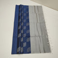 Blue and gray fabric with geometric patterns on a white background