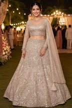 Mrudangi Griha Net With Beads Worked Lehenga Choli