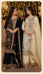 Two women in traditional outfits with 'Mridang' branding and 'Seema' design number 988-989 on a decorative background.