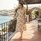 Beige floral printed cotton A-line kurti for women with three-quarter sleeves and front button placket