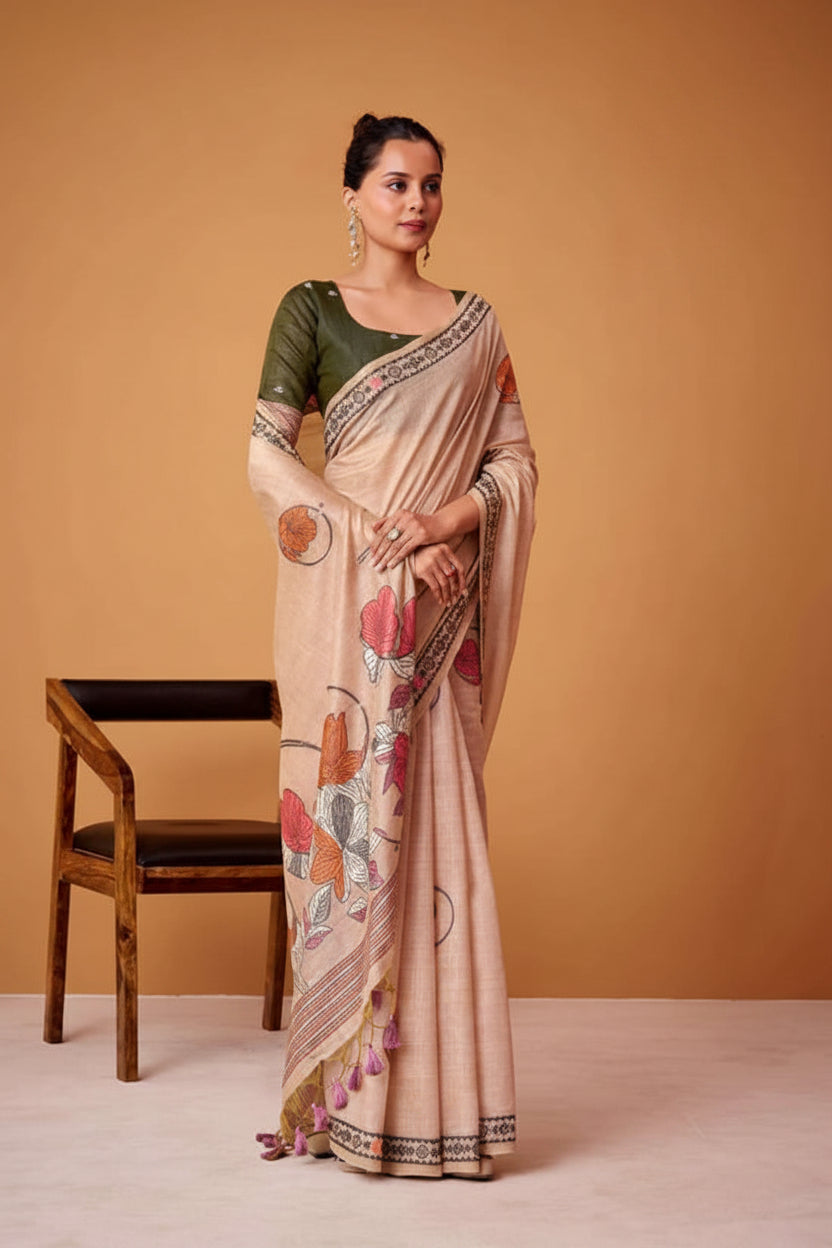 Woman wearing a saree with floral patterns against an orange background, featuring 'Rajpath' branding.