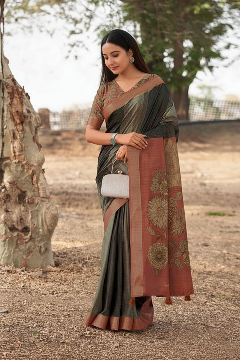 Woman wearing a saree with a tree and natural background